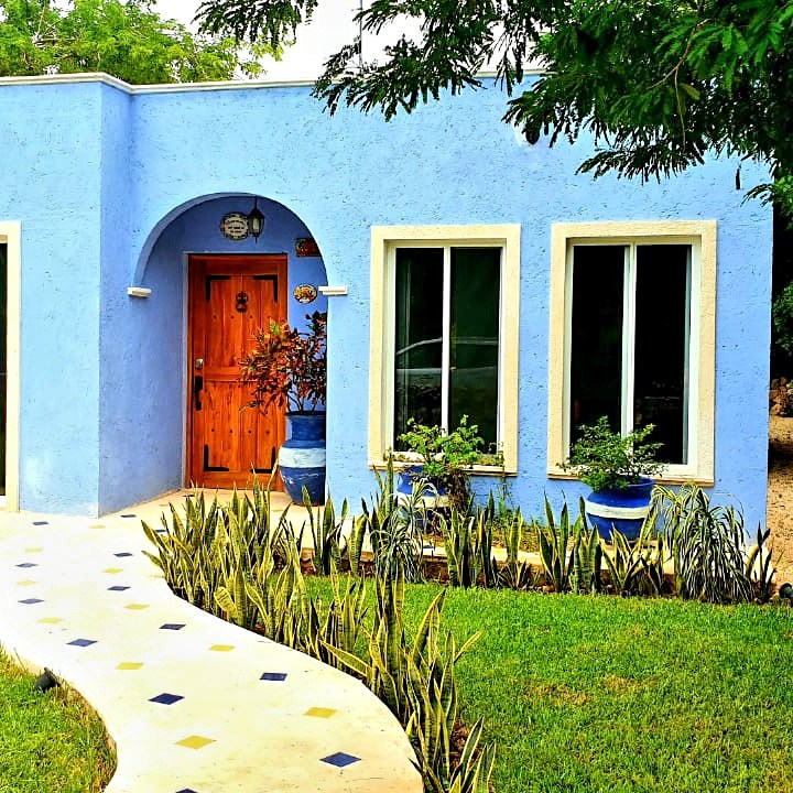 a large lawn in front of a house