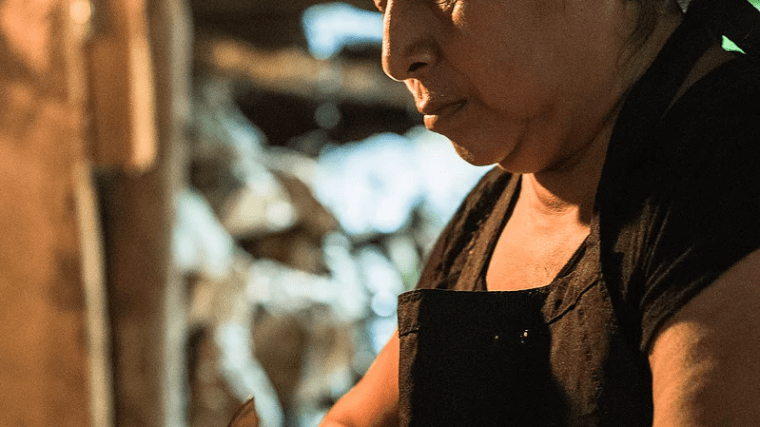 a man that is eating some food