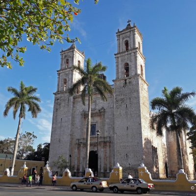 a group of people in front of a church