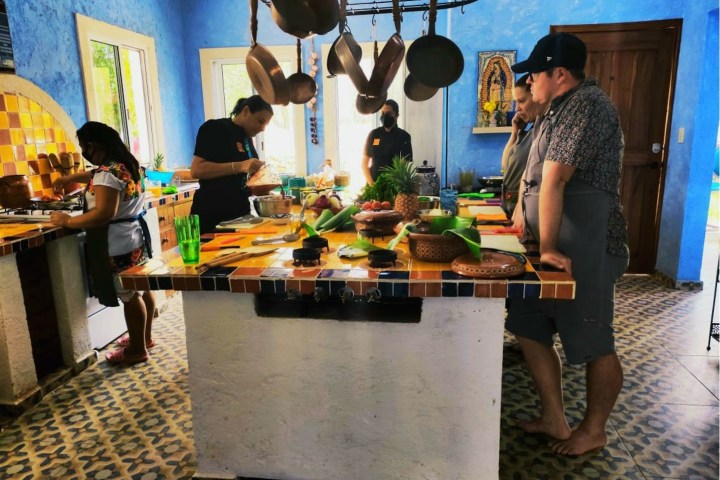 a group of people performing on a counter
