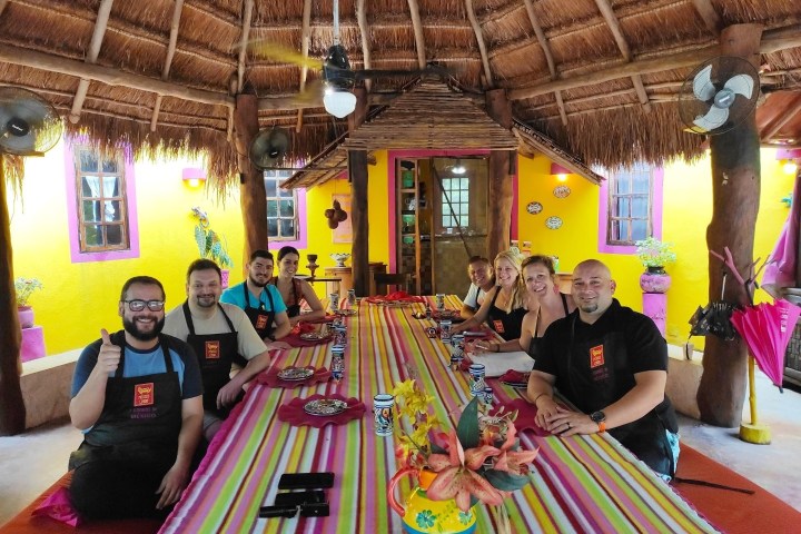 a group of people sitting at a table