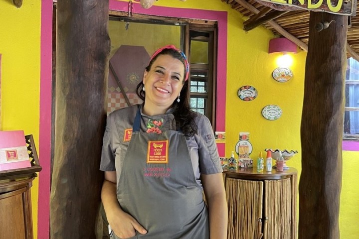 a man standing in front of a store
