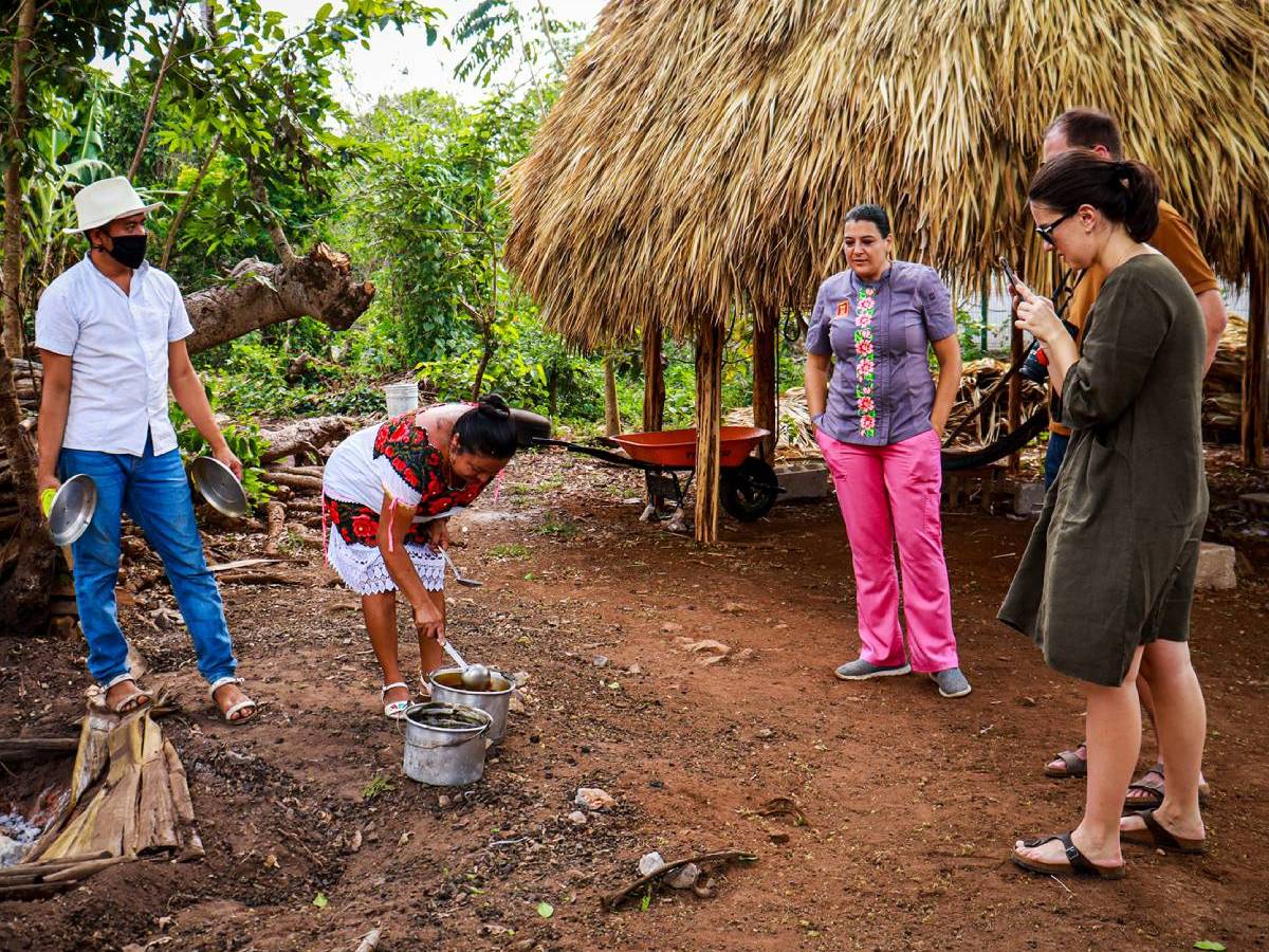 Birsel Vardarlı et al. walking down a dirt road