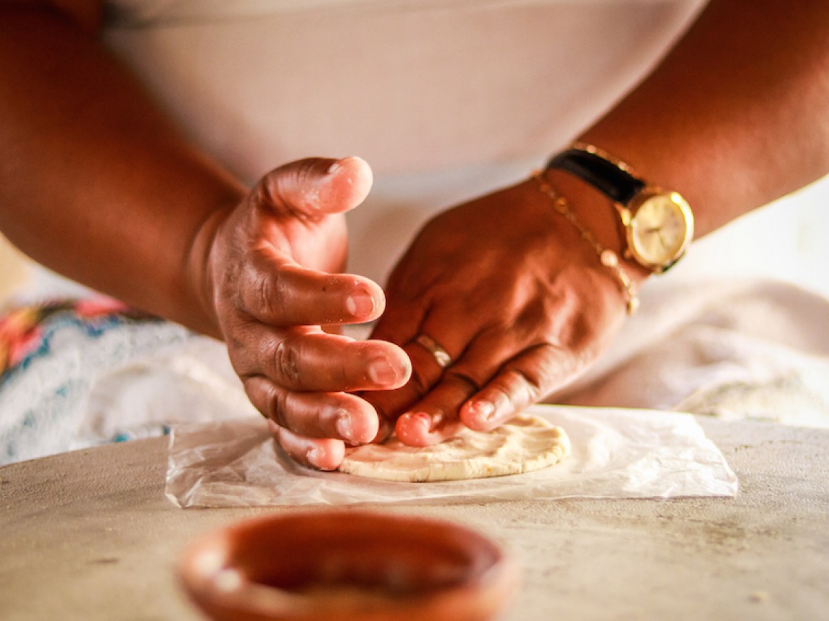 a person that is eating some food