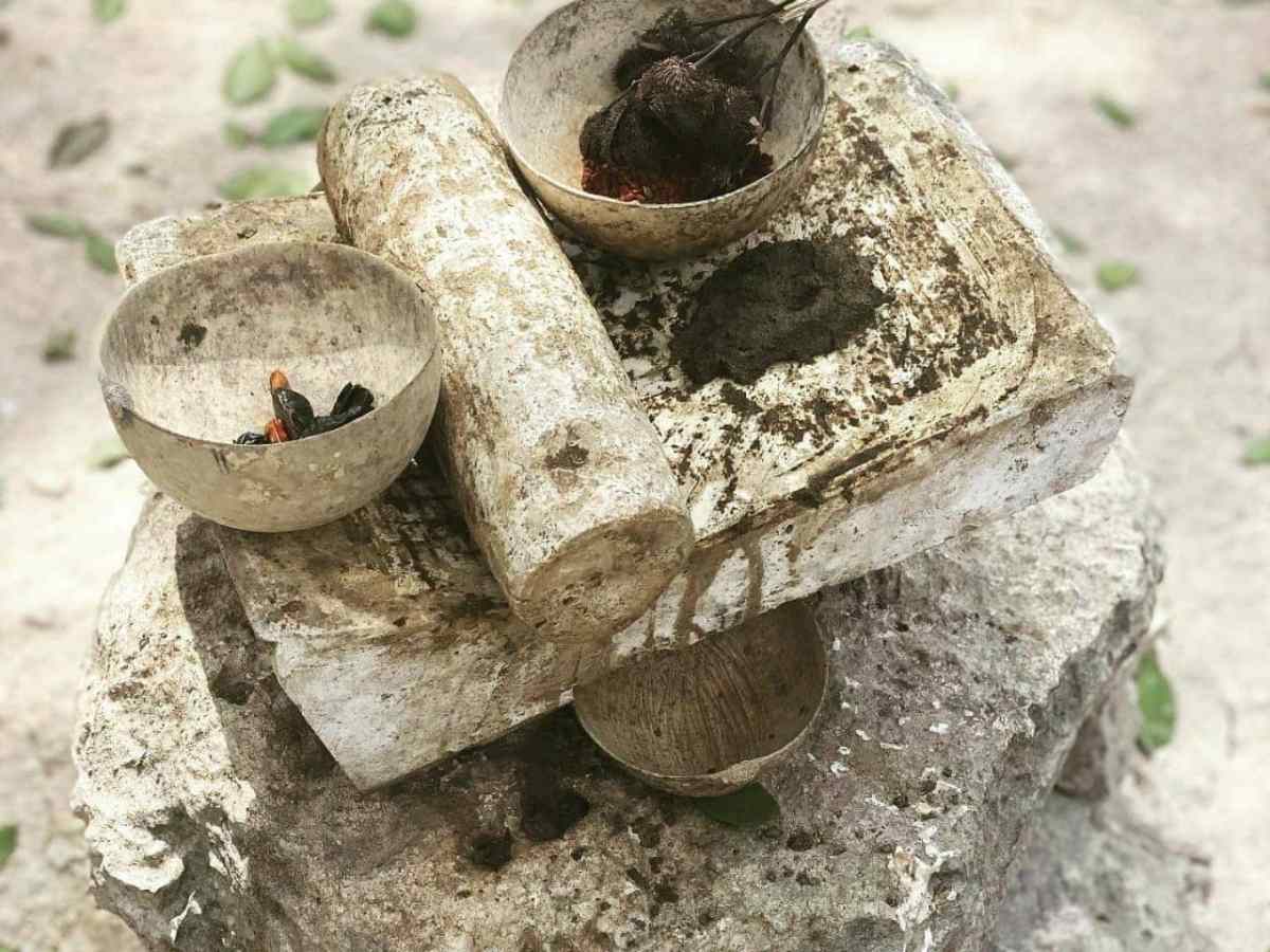 a piece of cake sitting on top of a dirt field