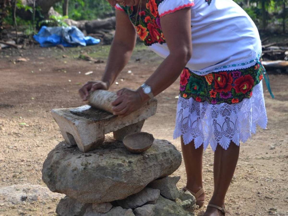 a man that is standing in the dirt